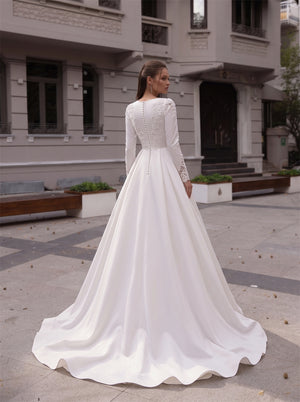 Long Sleeve Lace Applique Satin Wedding Dress Round Neck Vertical Button Bridal Gown